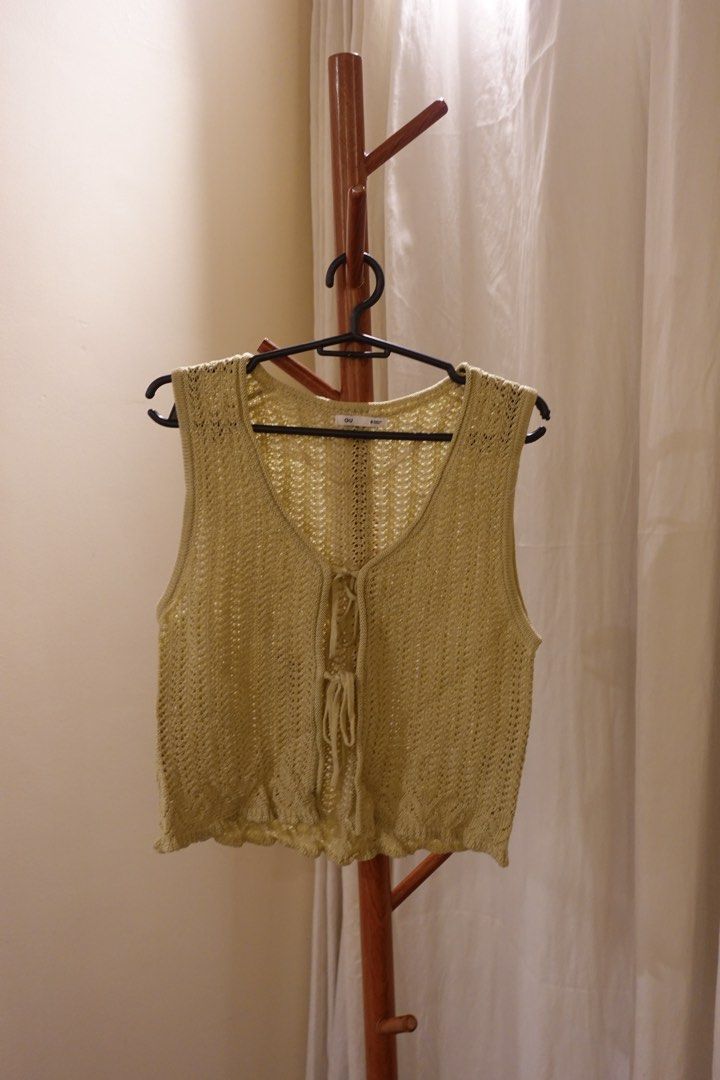 GU Knit Vest Size S (Category: Sleeveless) located in Pasig City. Submitted by hulyascloset (Listing ID 1464542710, Image 1). Description: - GU yellow knit vest - Lace-up front detail - Crochet-like texture - Ideal for layering over t-shirts or dresses - Versatile and simple styling piece COMES WITH ANOTHER TOP 🤭 BUY 1 TAKE 1 **the more items you get, the cheaper the price.