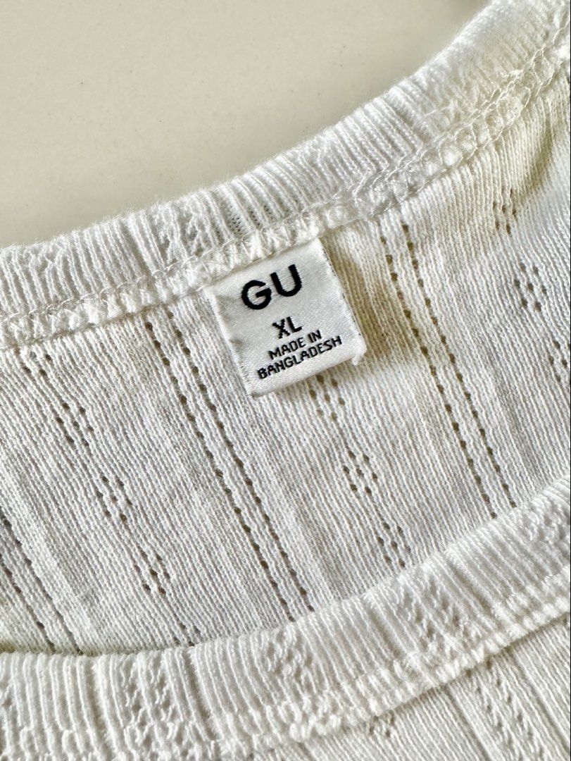 GU White Ribbed Knit T-shirt (Category: Shirts) located in Bulacan. Submitted by _arislmt (Listing ID 1464417762, Image 2). Description: - GU White Ribbed Knit T-Shirt - Short sleeves - Crew neck - Simple and classic design - Perfect for everyday outfits - Easy to pair with shorts or jeans - Made in Bangladesh - Size XL on tag but fits S-M.