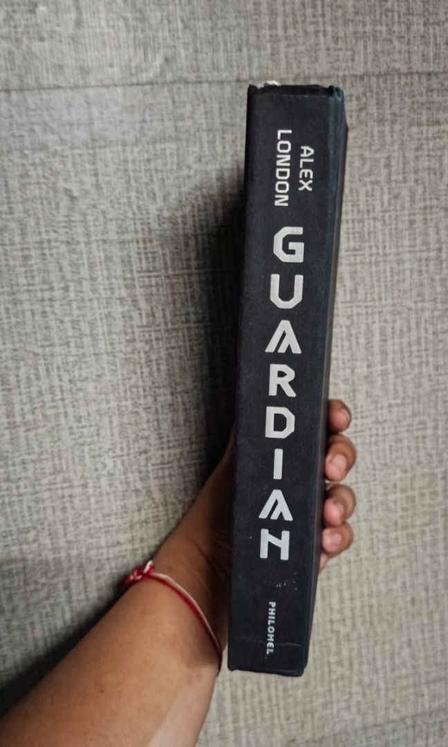 Guardian: The Sequel to Proxy by Alex London (Category: Storybooks) located in Paranaque City. Submitted by Jhayous (Listing ID 1464474903, Image 2). Description: - Guardian, the sequel to Proxy by Alex London. - Exciting sci-fi novel. - Features a striking cover with a cityscape. - "Off-the-charts amazing" - Marie Lu, New York Times. - A must-read for fans of the Legend Trilogy. -Hardbound.