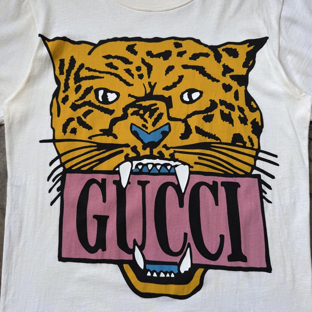Gucci - Leopard Head Print Shirt (Category: Tshirts & Polo Shirts ) located in Cavite. Submitted by 4118.ph (Listing ID 1464387655, Image 3). Description: XXS on tag oversized Cut care labels, authentic Width 18” Length 25.7”.