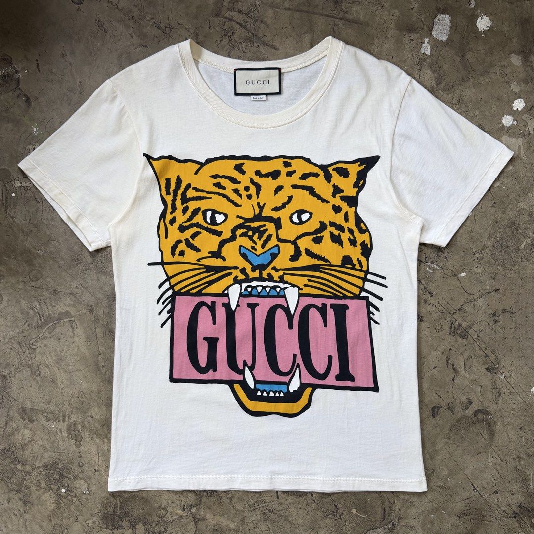Gucci - Leopard Head Print Shirt (Category: Tshirts & Polo Shirts ) located in Cavite. Submitted by 4118.ph (Listing ID 1464387655, Image 1). Description: XXS on tag oversized Cut care labels, authentic Width 18” Length 25.7”.