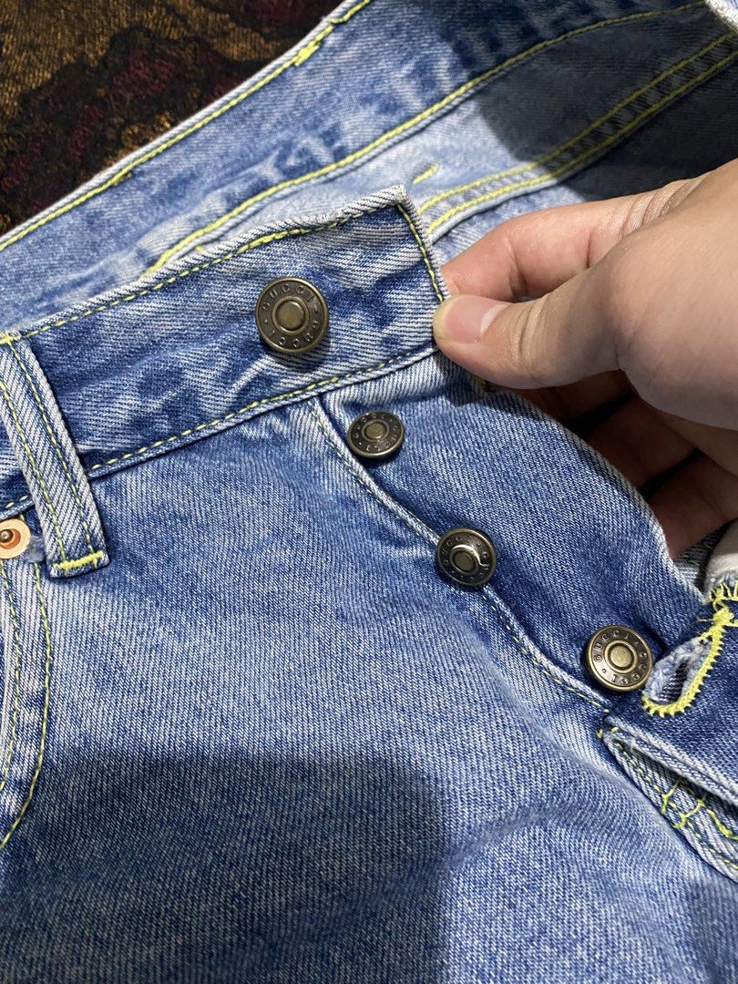 Gucci Embossed Leather Logo Patch Light Wash Straight Jeans (Category: Luxury Apparel) located in Candelaria. Submitted by bentablesetc (Listing ID 1464397882, Image 3). Description: Gucci Embossed Leather Logo Patch Light Wash Straight Jeans button fly Minor issue: Dent in 3rd button ( See last pic) but still usable W32 L37 Hem 6.5 700 + sf MOP: Gcash Courier: J&t Loc: Candelaria Quezon .