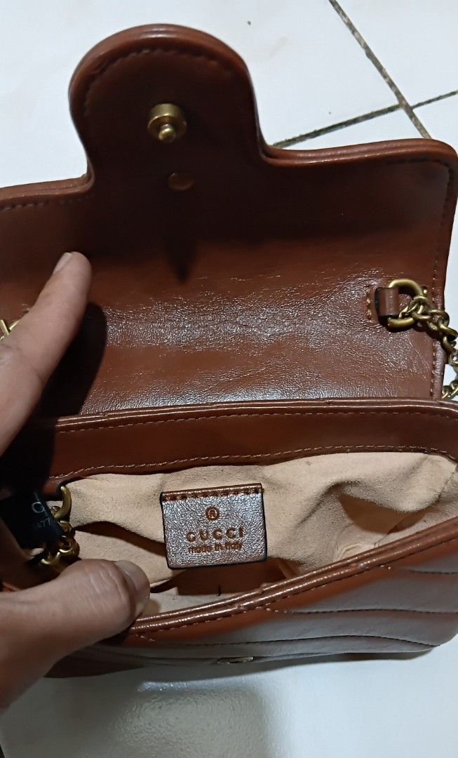GUCCI MARMONT MINI (Category: Cross-body Bags) located in Legazpi City. Submitted by nashaiza (Listing ID 1464472955, Image 3). Description: Gucci made in italy color: Brown coded: 476433 213048 gold hardware *authenticity not guarantee MOP: GCash Courier: J&T Express.