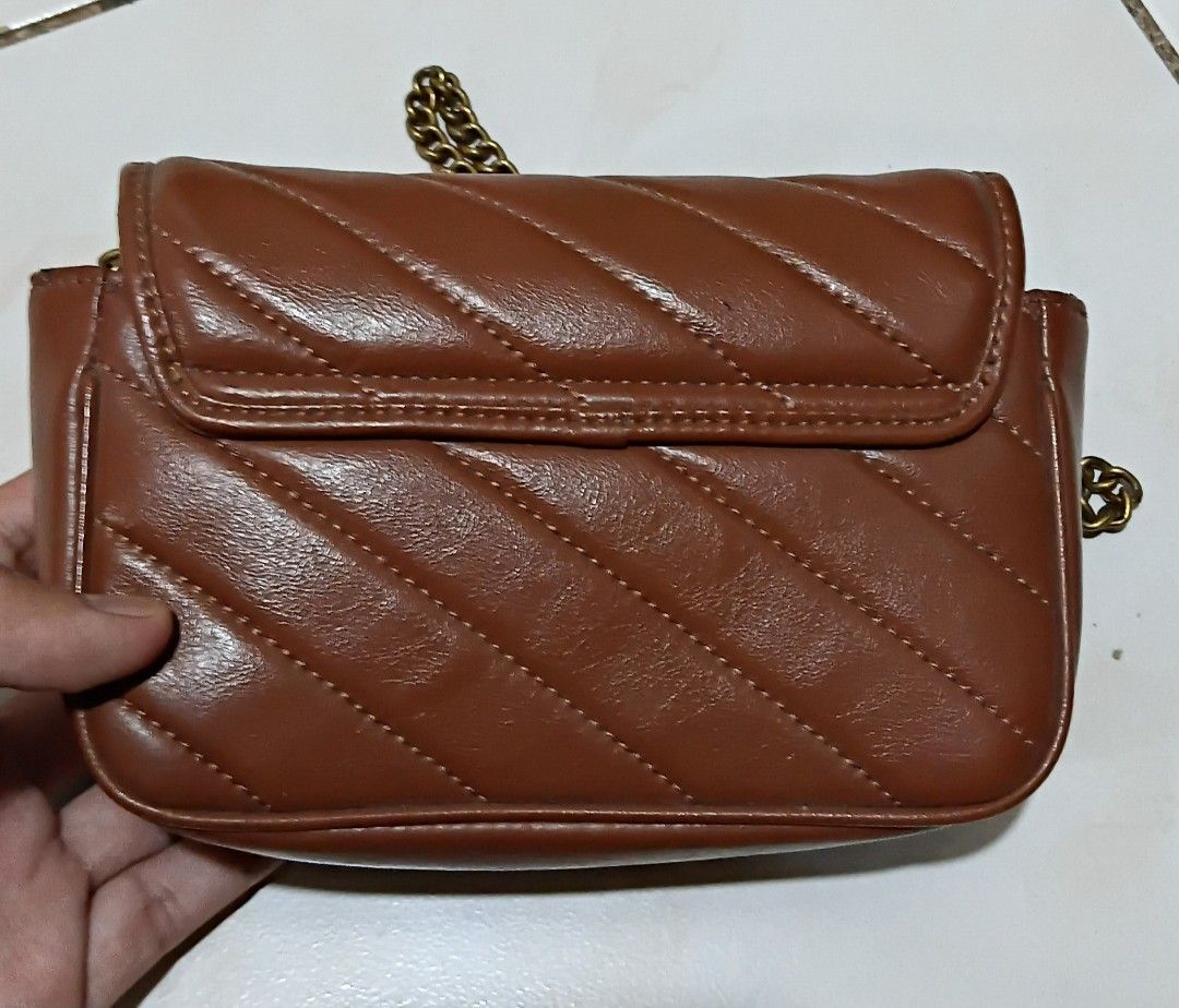 GUCCI MARMONT MINI (Category: Cross-body Bags) located in Legazpi City. Submitted by nashaiza (Listing ID 1464472955, Image 2). Description: Gucci made in italy color: Brown coded: 476433 213048 gold hardware *authenticity not guarantee MOP: GCash Courier: J&T Express.
