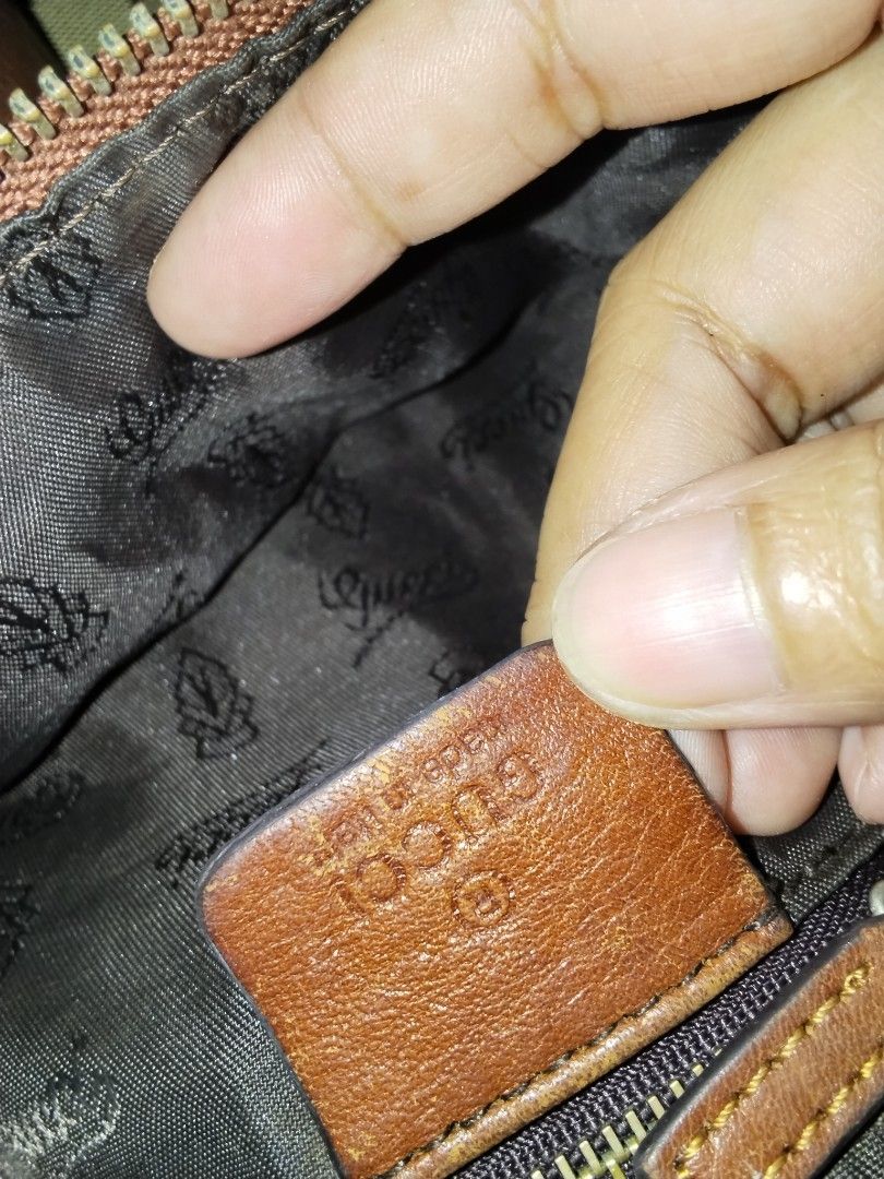 Gucci Shoulder bag (Category: Shoulder Bags) located in Cavite. Submitted by bagssection04 (Listing ID 1464409823, Image 2). Description: Gucci canvas shoulder bag on really good condition large size naka Gucci under zip.