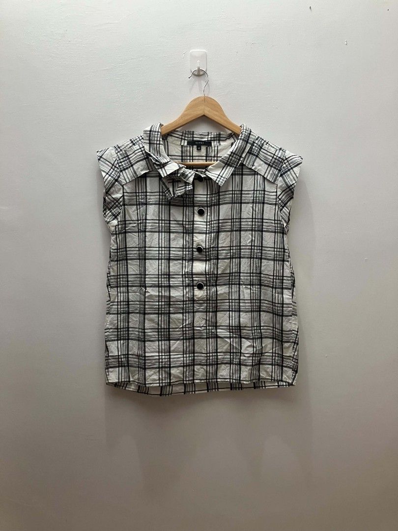 Gucci Sleeveless Shirt (Category: Sleeveless) located in Manila. Submitted by soflyapparel77 (Listing ID 1464437098, Image 1). Description: authentic dm for more details.