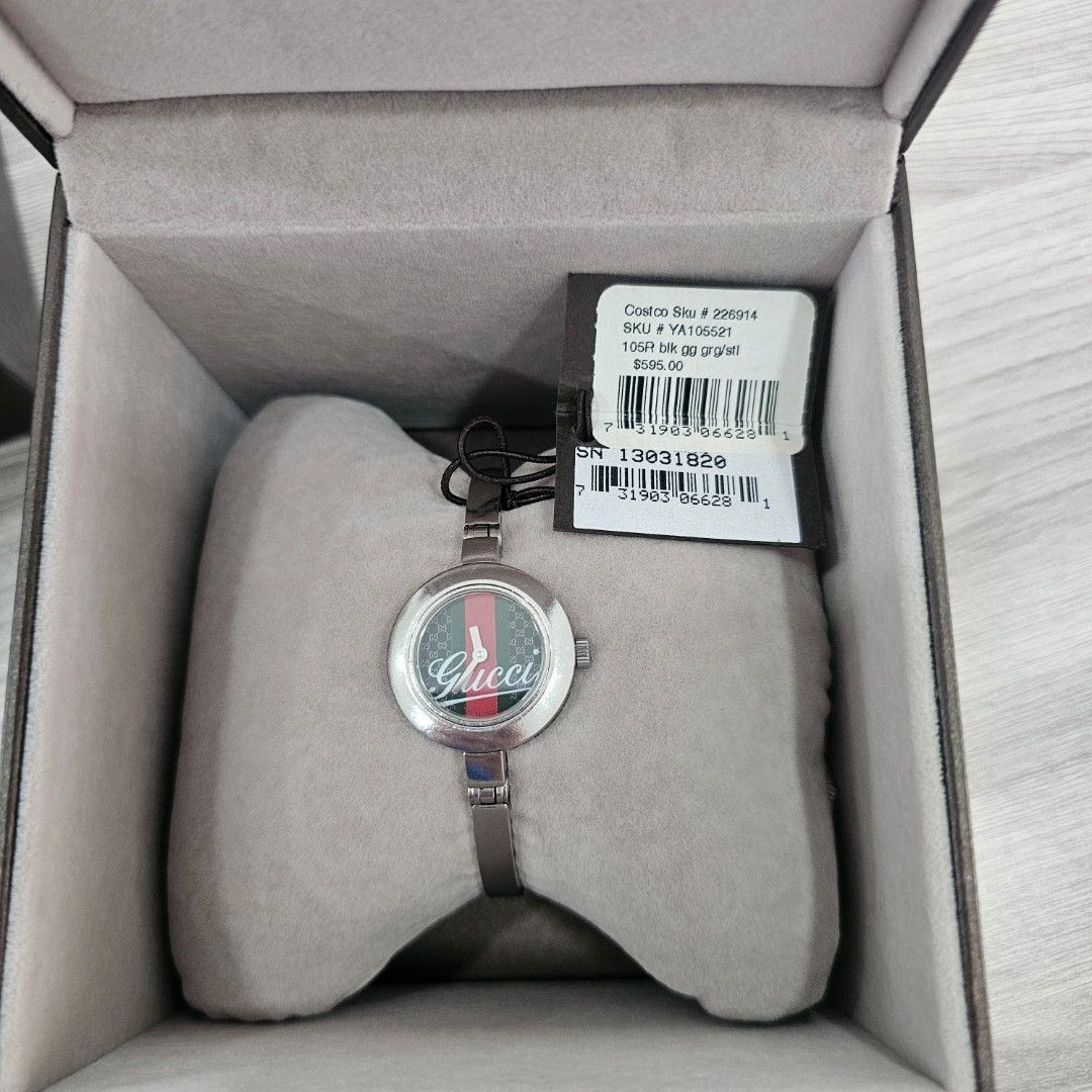 Gucci Watch YA105221 (Category: Luxury Watches) located in Quezon City. Submitted by innactln (Listing ID 1464389664, Image 3). Description: - Authentic Gucci Watch - Model: YA105221 - Band: Silver - Face: Round with green and red Gucci logo - Includes: Original box and tags - Serial Number: SN 13031820 - Condition: Great accessory.