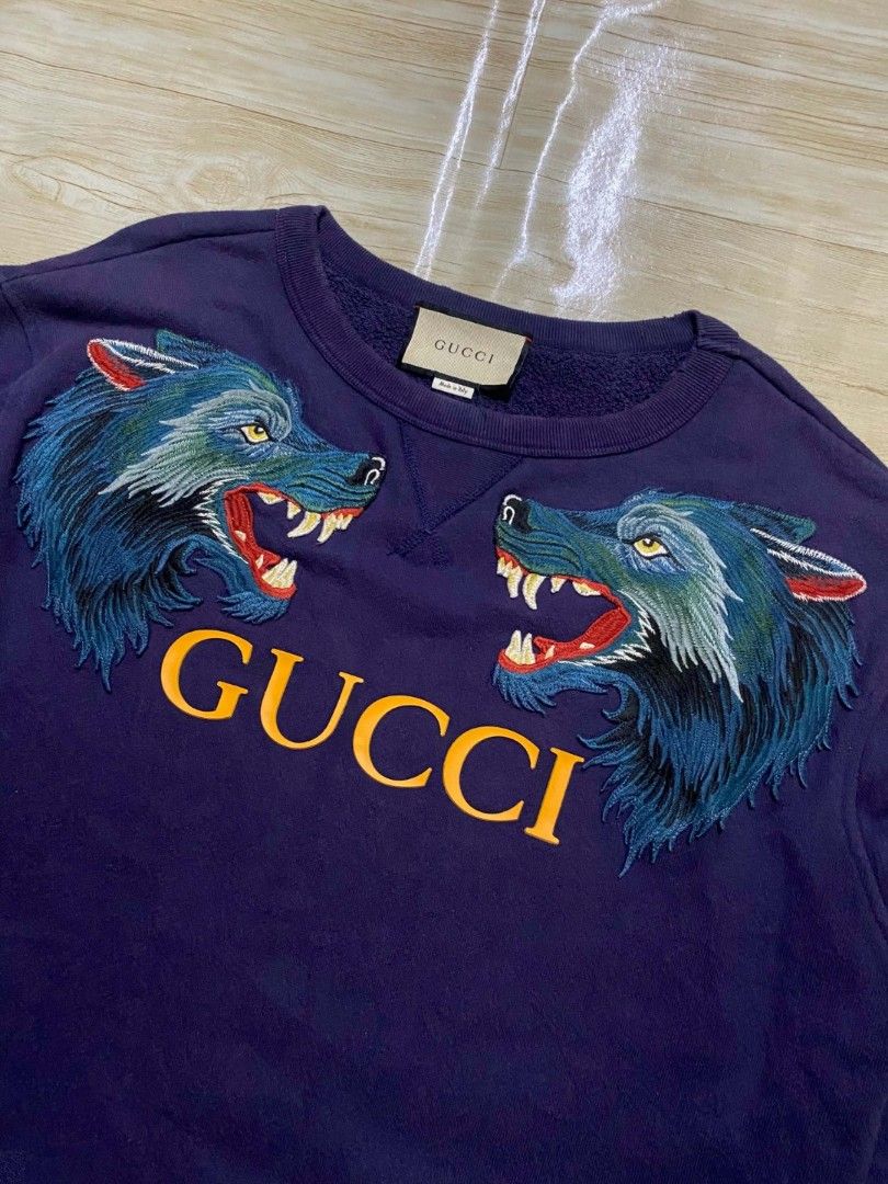 Gucci Wolf Head Appliques (Category: Hoodies) located in Manila. Submitted by jihan.nunez_8 (Listing ID 1464475399, Image 2). Description: W24 L28 no issue silicone print yung gucci letter and yung wolf embroidery carpet.