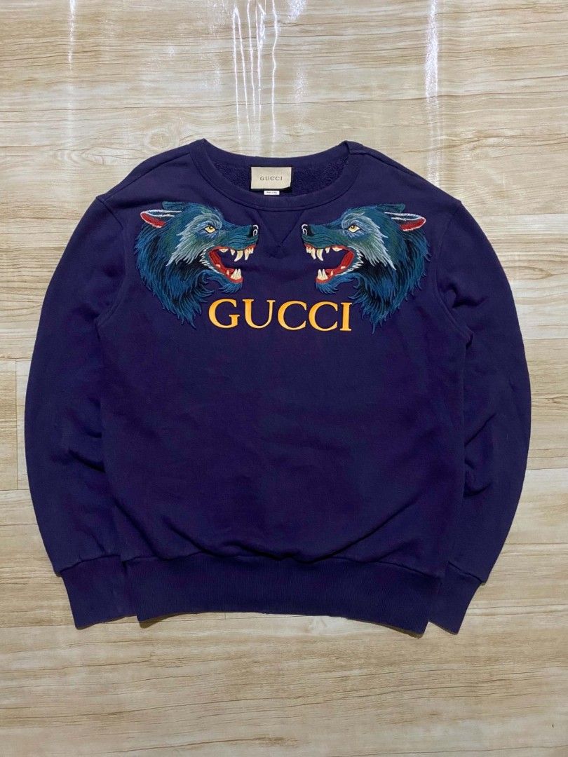 Gucci Wolf Head Appliques (Category: Hoodies) located in Manila. Submitted by jihan.nunez_8 (Listing ID 1464475399, Image 1). Description: W24 L28 no issue silicone print yung gucci letter and yung wolf embroidery carpet.