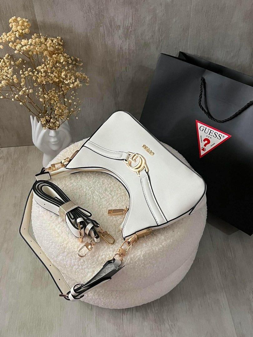 GUESS 2 way SLING BAG (Category: Purses & Pouches) located in Manila. Submitted by businesspform (Listing ID 1464482410, Image 2). Description: 🎀GUESS 2 WAY SLING BAG 🏷️2850 only With dustbag & bag only.