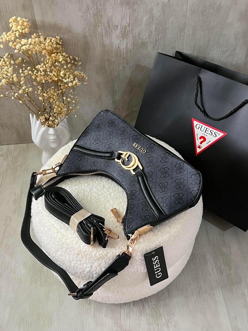 GUESS 2 way SLING BAG (Category: Purses & Pouches) located in Manila. Submitted by businesspform (Listing ID 1464482410, Image 1). Description: 🎀GUESS 2 WAY SLING BAG 🏷️2850 only With dustbag & bag only.