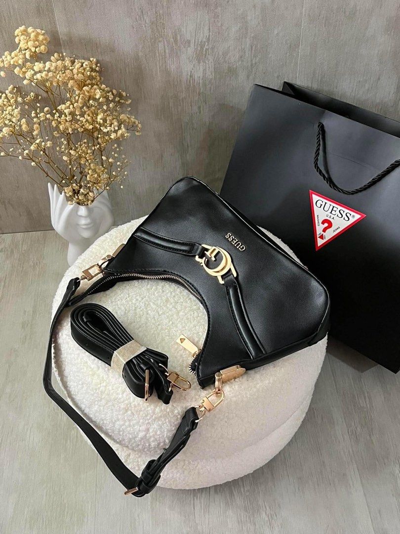 GUESS 2 way SLING BAG (Category: Purses & Pouches) located in Manila. Submitted by businesspform (Listing ID 1464482410, Image 3). Description: 🎀GUESS 2 WAY SLING BAG 🏷️2850 only With dustbag & bag only.