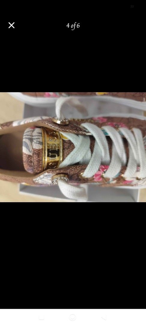 Guess Floral Monogram Sneakers (Category: Sneakers) located in Manila. Submitted by marriage031073advocate (Listing ID 1464405824, Image 2). Description: - Guess sneakers - Brown floral monogram print - White laces - Gold accents - Comfortable and stylish for everyday wear - Comes in a Guess box.