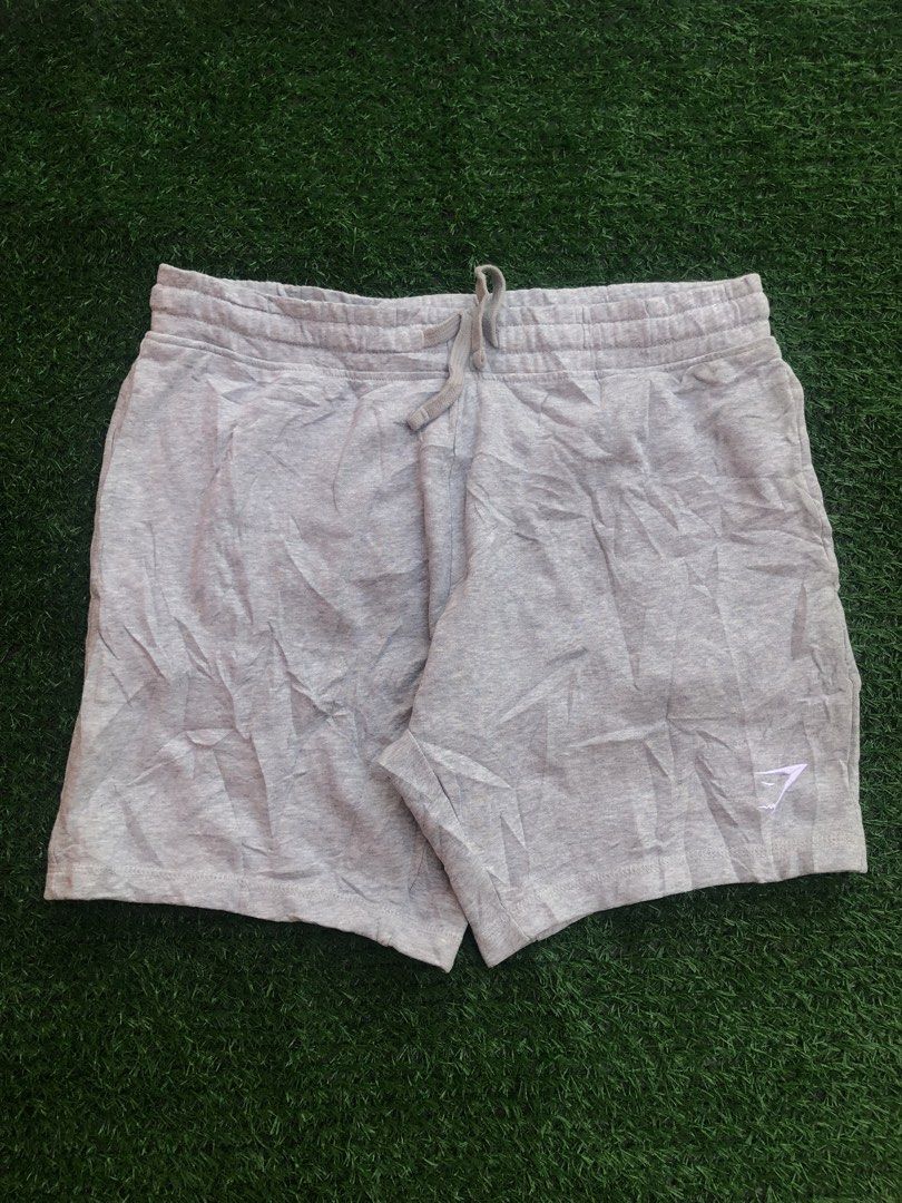 Gymshark Grey Sweat Shorts Size L (Category: Shorts) located in Manila. Submitted by gaboylekin96496 (Listing ID 1464420539, Image 2). Description: - Gymshark Grey Sweat Shorts - Size: Large (L) - Origin: Made in Bangladesh - Versatile: Perfect for workouts or casual wear - Features: Adjustable drawstring waist - Branding: Gymshark logo on the leg. GYM SHARK (Crest Short) Gray -Authentic/Legit -Excellent Condition -Issue None -Need wash Only -Siz