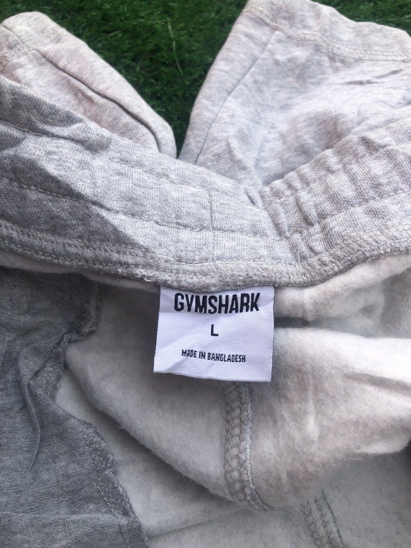 Gymshark Grey Sweat Shorts Size L (Category: Shorts) located in Manila. Submitted by gaboylekin96496 (Listing ID 1464420539, Image 3). Description: - Gymshark Grey Sweat Shorts - Size: Large (L) - Origin: Made in Bangladesh - Versatile: Perfect for workouts or casual wear - Features: Adjustable drawstring waist - Branding: Gymshark logo on the leg. GYM SHARK (Crest Short) Gray -Authentic/Legit -Excellent Condition -Issue None -Need wash Only -Siz