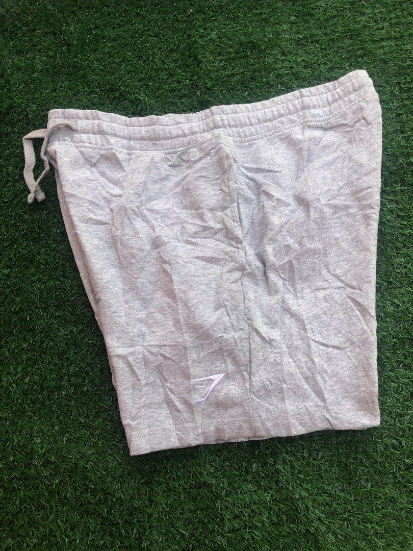 Gymshark Grey Sweat Shorts Size L (Category: Shorts) located in Manila. Submitted by gaboylekin96496 (Listing ID 1464420539, Image 1). Description: - Gymshark Grey Sweat Shorts - Size: Large (L) - Origin: Made in Bangladesh - Versatile: Perfect for workouts or casual wear - Features: Adjustable drawstring waist - Branding: Gymshark logo on the leg. GYM SHARK (Crest Short) Gray -Authentic/Legit -Excellent Condition -Issue None -Need wash Only -Siz