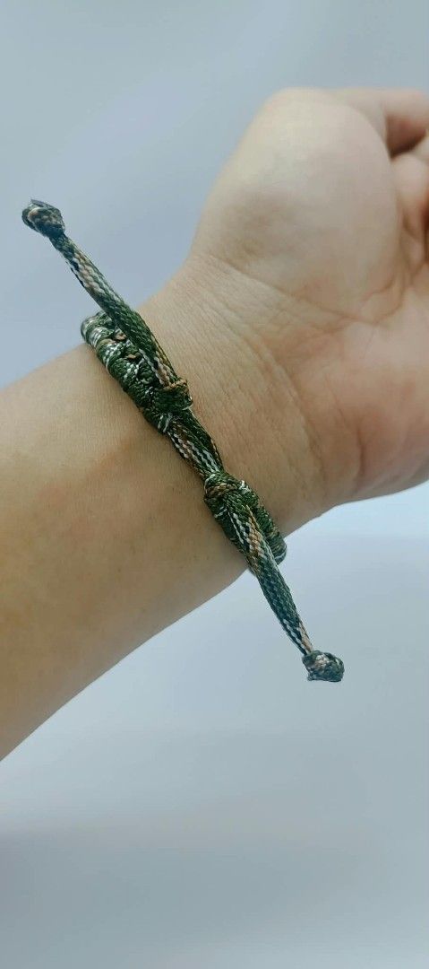 Handmade Braided Cord Bracelet - Camo & Tan (Category: Bracelets) located in Manila. Submitted by kokop3 (Listing ID 1464562834, Image 3). Description: - Handmade braided cord bracelets - Available in camouflage (green, brown, white) and solid tan - Adjustable tie closure for a perfect fit - Ideal for casual wear - Makes a unique gift.