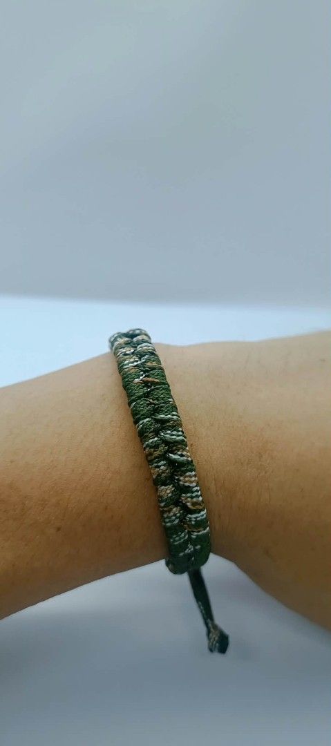 Handmade Braided Cord Bracelet - Camo & Tan (Category: Bracelets) located in Manila. Submitted by kokop3 (Listing ID 1464562834, Image 2). Description: - Handmade braided cord bracelets - Available in camouflage (green, brown, white) and solid tan - Adjustable tie closure for a perfect fit - Ideal for casual wear - Makes a unique gift.