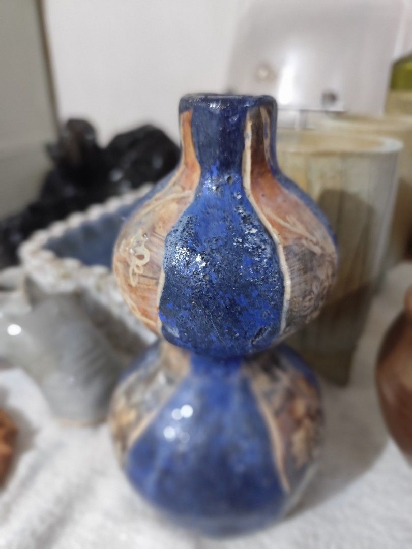 Handmade Ceramic Double Gourd Vase Blue and Brown (Category: Vases & Decorative Bowls) located in Manila. Submitted by marriage031073advocate (Listing ID 1464419272, Image 1). Description: - Unique handmade ceramic vase - Double gourd shape - Textured blue and brown glaze - Ideal for small dried flowers - Adds a pop of color as a decorative piece.