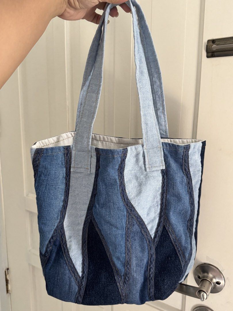 Upcycled Denim Patchwork Tote Bag (Category: Tote Bags) located in Pasay City. Submitted by margucci_0823 (Listing ID 1464411378, Image 1). Description: - Upcycled denim bag - Nin&Yang inspired!! - White fabric lining inside with a convenient denim pocket - Very sturdy!!! and comfortable handles - No zipper/button; open-style Delivery shouldered by buyer via Lalamove 📍Betterliving, Pque .