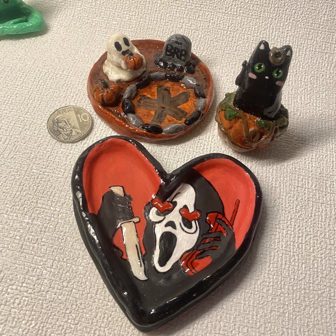 Handmade Halloween Themed BUNDLE SALE (Category: Art & Prints) located in Dasmarinas. Submitted by chunli_ (Listing ID 1464449320, Image 3). Description: Handmade Clay Art Figurines Bundle Deal TAKE ALL Includes: Cat Pumpkin Desk Buddy — 200 Ghost Candle Holder 8CM — 260 Scream Trinket Dish 10CM — 350 Shipping: J&T, Lalamove, GogoXpress Location: Salawag, Dasmariñas can ship NATIONWIDE.