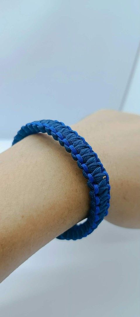 Handmade Paracord Bracelet - Blue & Black (Category: Bracelets) located in Manila. Submitted by kokop3 (Listing ID 1464562333, Image 2). Description: - Cool handmade paracord bracelet - Braided design in dark blue with lighter blue accents - Plain black option also available - Secure knot closure - Great for everyday wear or outdoor activities - Durable and stylish.