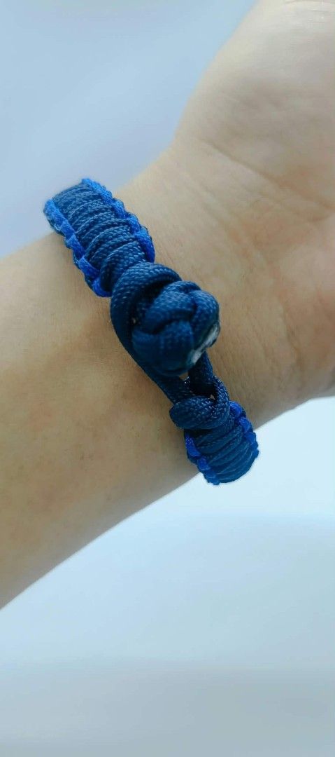 Handmade Paracord Bracelet - Blue & Black (Category: Bracelets) located in Manila. Submitted by kokop3 (Listing ID 1464562333, Image 3). Description: - Cool handmade paracord bracelet - Braided design in dark blue with lighter blue accents - Plain black option also available - Secure knot closure - Great for everyday wear or outdoor activities - Durable and stylish.