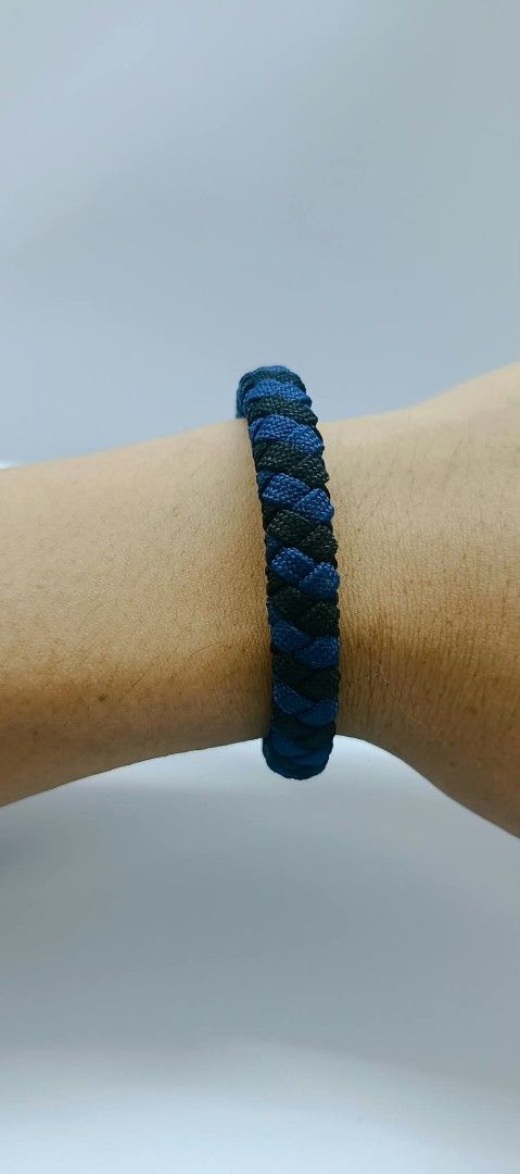Handmade Paracord Bracelets - Blue/Black & Red/Grey (Category: Bracelets) located in Manila. Submitted by kokop3 (Listing ID 1464561870, Image 1). Description: - Two handmade paracord bracelets: 1 blue/black, 1 red/grey. - Features a durable braided design. - Unique knot closure for a secure fit. - Stylish and perfect for casual wear. - Makes a great gift! - Special offer: Get both bracelets at a fantastic price..