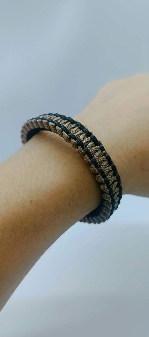 Handmade Paracord Bracelets - Multiple Colors Available (Category: Bracelets) located in Manila. Submitted by kokop3 (Listing ID 1464562479, Image 1). Description: - Handmade paracord bracelets - Available in Tan & Black or Red & Blue - Durable paracord construction - Secure knot closure - Ideal for everyday wear and outdoor adventures - Unique accessory.