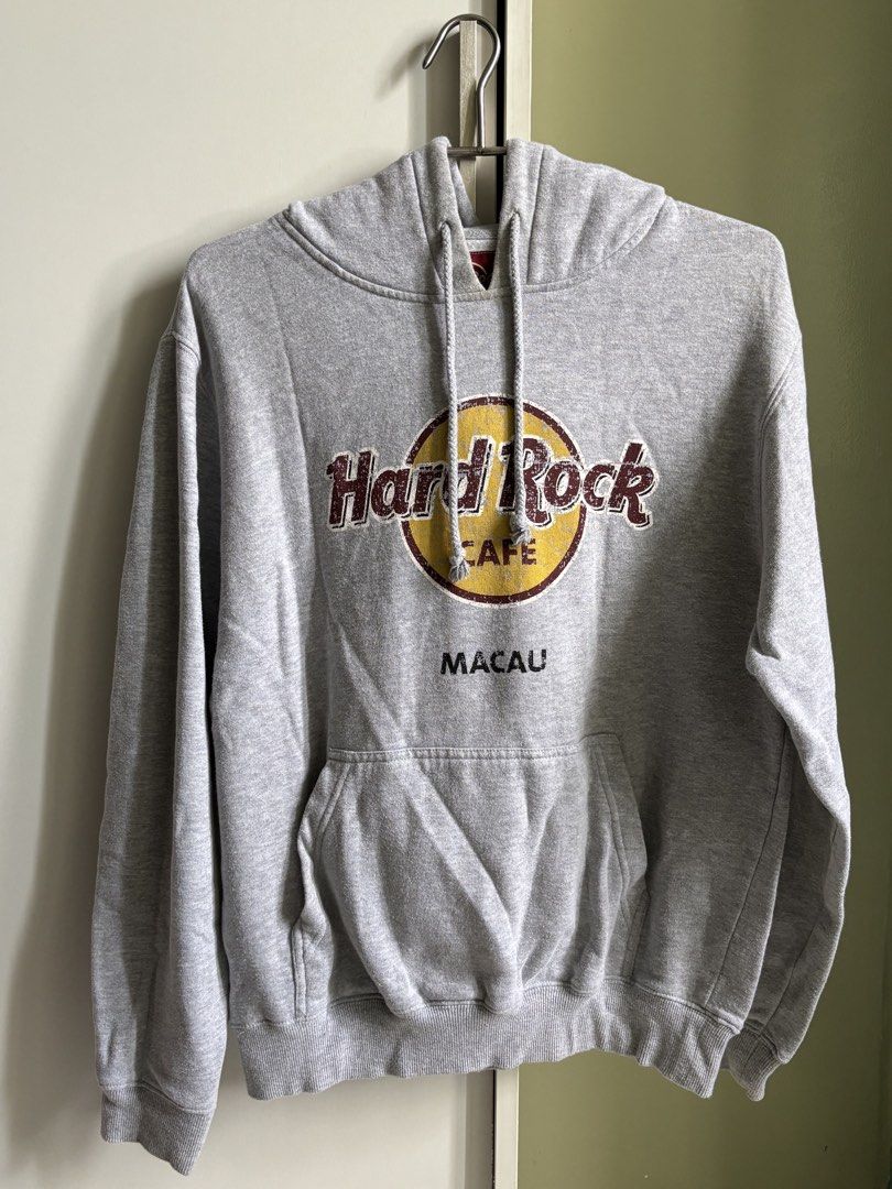 Hard Rock Cafe Macau Pullover Hoodie (Category: Coats, Jackets and Outerwear) located in Quezon City. Submitted by saveproject (Listing ID 1464426240, Image 1). Description: Classic Hard Rock Cafe Macau Logo Pullover Hoodie Color: Gray Size: Medium Condition: Fair to Good Pre-Owned Condition. Please note there is a seam split/tear along the lower edge of the sleeve arm (see last photo for detail). It can be easily repaired with a quick stitch if 