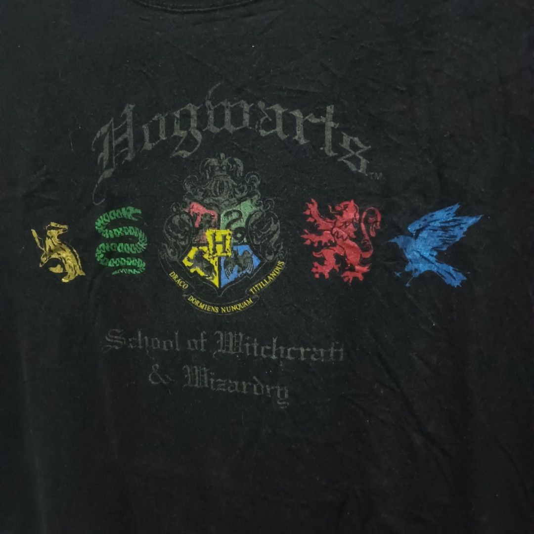 HARRY POTTER Logo Shirt (Category: Shirts) located in Caloocan City. Submitted by jaychingsss (Listing ID 1464402516, Image 3). Description: Harry Potter Logo Shirt - 100 20x26.5 Color Rate: 9.5/10 NEED WASH.