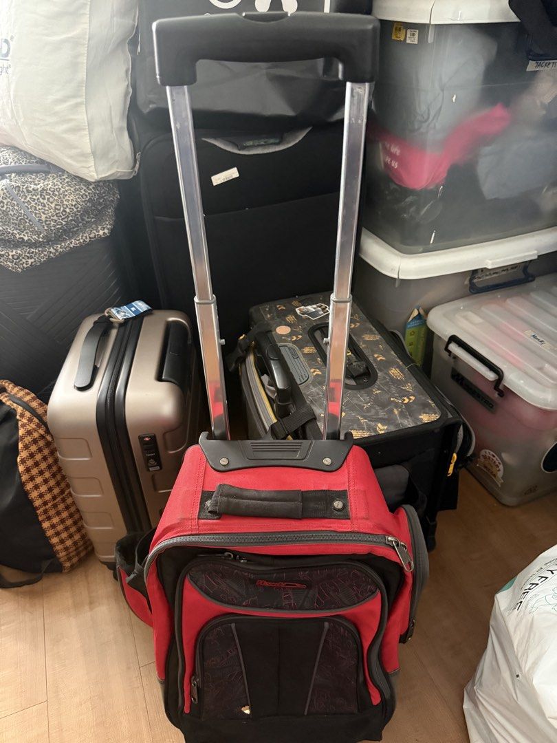 Hawk Red & Black Rolling Backpack Luggage (Category: Backpacks) located in Quezon City. Submitted by krisallie (Listing ID 1464460335, Image 3). Description: - Red and black rolling backpack - Retractable handle and wheels for easy transport - Multiple compartments and pockets for organization - Side mesh pocket for water bottle - Ideal for travel or school - Shows some signs of wear, but fully functional.