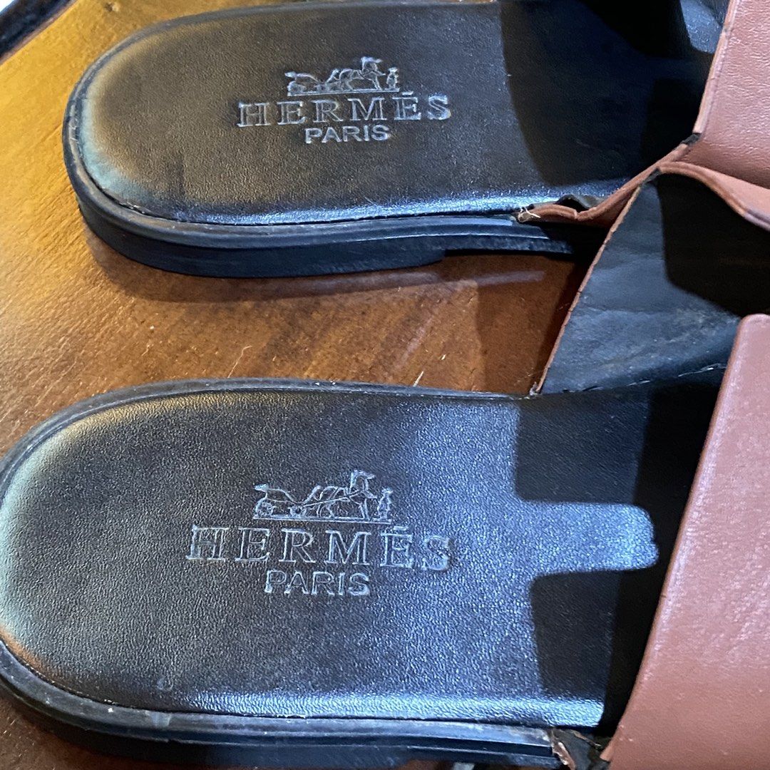 Hermes Paris Brown Leather Slides Sandals (Category: Sneakers & Footwear) located in Caloocan City. Submitted by camarcenin42067 (Listing ID 1464481322, Image 2). Description: - Authentic Hermes Paris brown leather slides - Classic H design - Comfortable slip-on style - Ideal for casual wear.