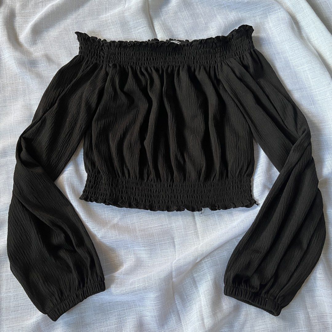 h&m black smocked off shoulder top (Category: Blouses) located in Tacloban City. Submitted by deartrunkcloset (Listing ID 1464563994, Image 1). Description: - P180 - XS - issue: h&m divided tag was cut (negotiable).