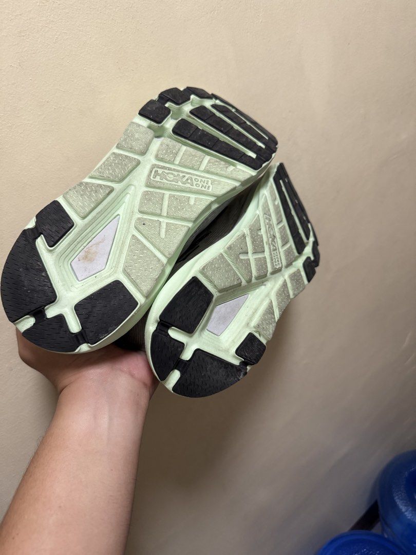 Hoka One One U Elevon 2 (Category: Sneakers) located in Rizal. Submitted by rarestorm.99d68b (Listing ID 1464497133, Image 2). Description: - Hoka One One U Elevon 2 TS Running Shoes - Size: US Women's 11 - Color: Light Grey & White upper with Neon Green sole - Features: ProFly cushioning - Ideal for: Running and everyday wear - Includes: Original box.
