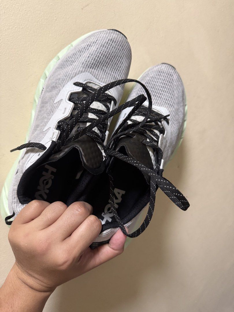 Hoka One One U Elevon 2 (Category: Sneakers) located in Rizal. Submitted by rarestorm.99d68b (Listing ID 1464497133, Image 3). Description: - Hoka One One U Elevon 2 TS Running Shoes - Size: US Women's 11 - Color: Light Grey & White upper with Neon Green sole - Features: ProFly cushioning - Ideal for: Running and everyday wear - Includes: Original box.
