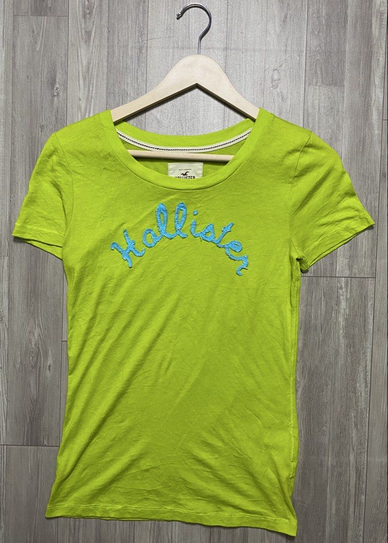 HOLLISTER y2k CURSIVE SCRIPT LOGO TEE - LIME GREEN (Category: Shirts) located in Manila. Submitted by ztfirtfritz (Listing ID 1464447240, Image 1). Description: HOLLISTER y2k CURSIVE SCRIPT LOGO TEE - LIME GREEN LEGIT MEDIUM MEASUREMENTS” SHOULDER: 15 SLEEVE: 6.5 PIT: 16 LENGTH: 24 350 + SF.
