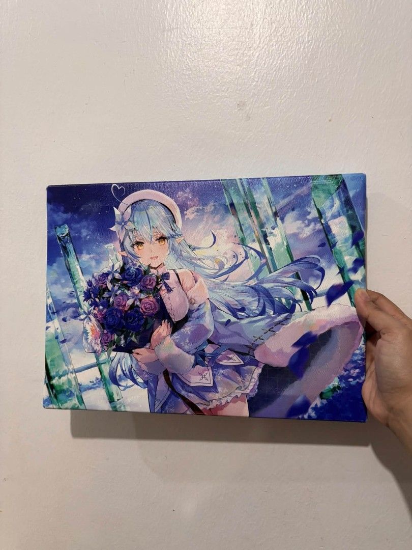 HOLOLIVE anniversary canvas (Category: Art & Prints) located in Cavite. Submitted by l1ttlelulu (Listing ID 1464528788, Image 1). Description: - Anime canvas print featuring a blue-haired girl. - Holds a beautiful bouquet of purple flowers. - Dreamy, starry sky background with blue and green accents. - Ideal for decorating your room. - Makes a great gift for anime enthusiasts. - Comes ready to hang..