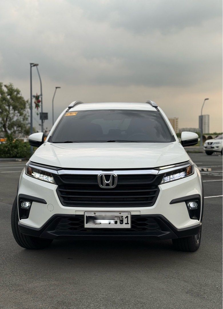 Honda BR-V (Category: Used Cars) located in Manila. Submitted by christian33sze (Listing ID 1464451400, Image 2). Description: 2023 Honda BRV 1.5 S CVT AT Gas 1st Owner 22k Orig Mileage (unli scan) Automatic transmission Push Start Button 7 Seater Fabric Seat Daytime Running Light Touch Screen Head Unit Reverse Camera Fog Light Thick tires No accident History Not flooded Newly pms Complete papers Registered 2027 2 Remote key 798,000 Negotiable 📍