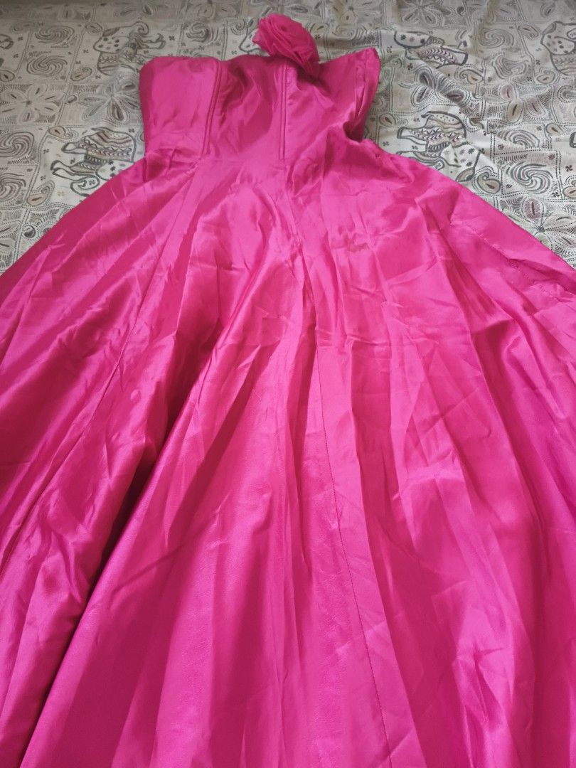 Hot Pink Ball Gown (Category: Evening dresses & gowns) located in Tanay. Submitted by thegoodseed (Listing ID 1464377278, Image 2). Description: - Gorgeous hot pink ball gown - Strapless design - Full, flowing skirt with a beautiful sheen - Structured bodice for a flattering fit - Ideal for formal events, parties, or prom - Guaranteed to turn heads!.