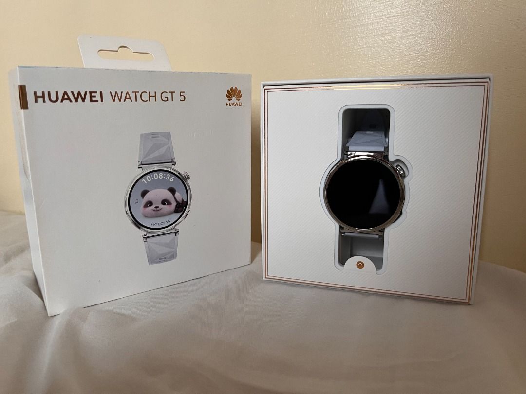 Huawei Watch GT 5 (Category: Wearables & Smart Watches) located in Pasay City. Submitted by reidene.ph (Listing ID 1464435751, Image 1). Description: Barely used Huawei Watch GT 5. Only used for tracking running and daily wear until I stopped wearing it completely. Smart watches just aren't for me </3 Here are some details: - Brand: Huawei - Model: Watch GT 5 - Size: 41 mm / 1.32-inch AMOLED circular display, a 9.5mm slim profile, and a stainless