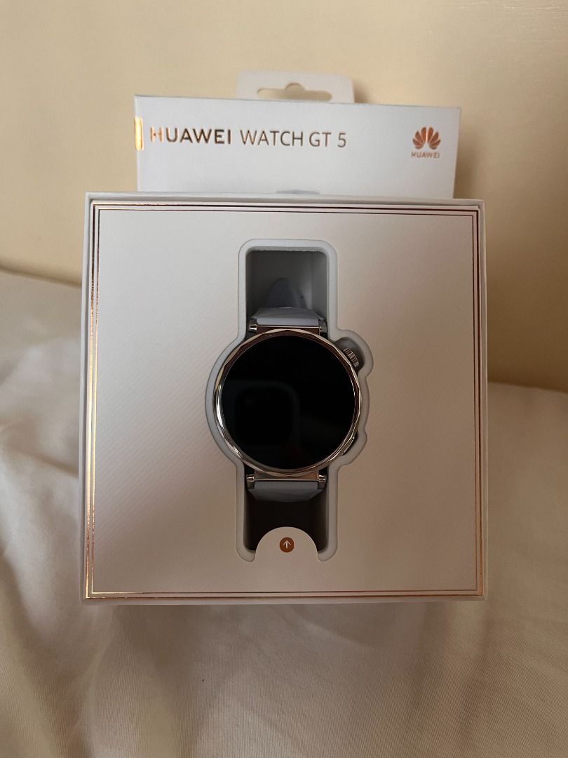 Huawei Watch GT 5 (Category: Wearables & Smart Watches) located in Pasay City. Submitted by reidene.ph (Listing ID 1464435751, Image 2). Description: Barely used Huawei Watch GT 5. Only used for tracking running and daily wear until I stopped wearing it completely. Smart watches just aren't for me </3 Here are some details: - Brand: Huawei - Model: Watch GT 5 - Size: 41 mm / 1.32-inch AMOLED circular display, a 9.5mm slim profile, and a stainless