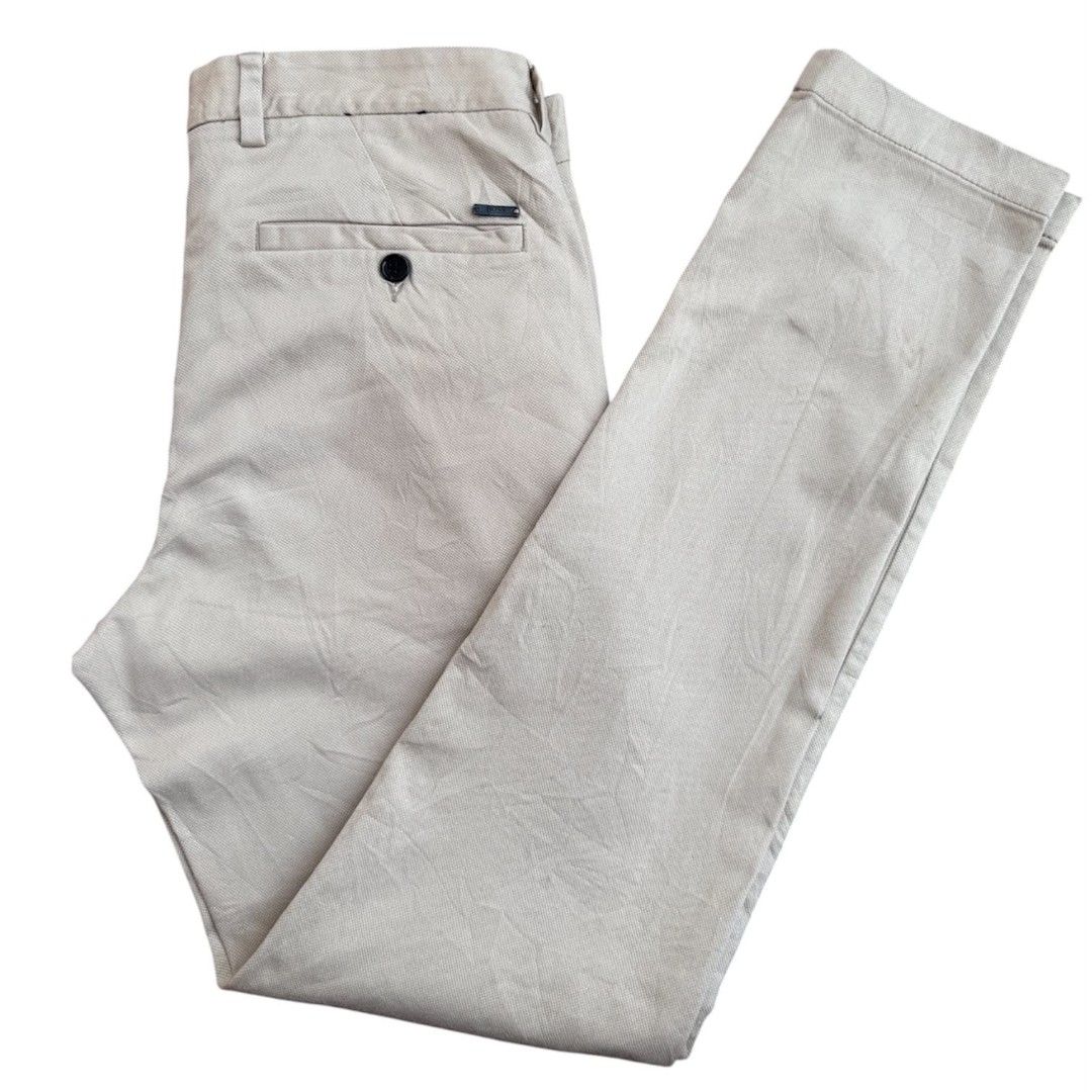 Hugo Boss (Category: Chinos) located in Kabankalan. Submitted by secondhandgems2 (Listing ID 1464379404, Image 1). Description: Size 30-32W x 39L x 6hem Excellent Condition No flaws.