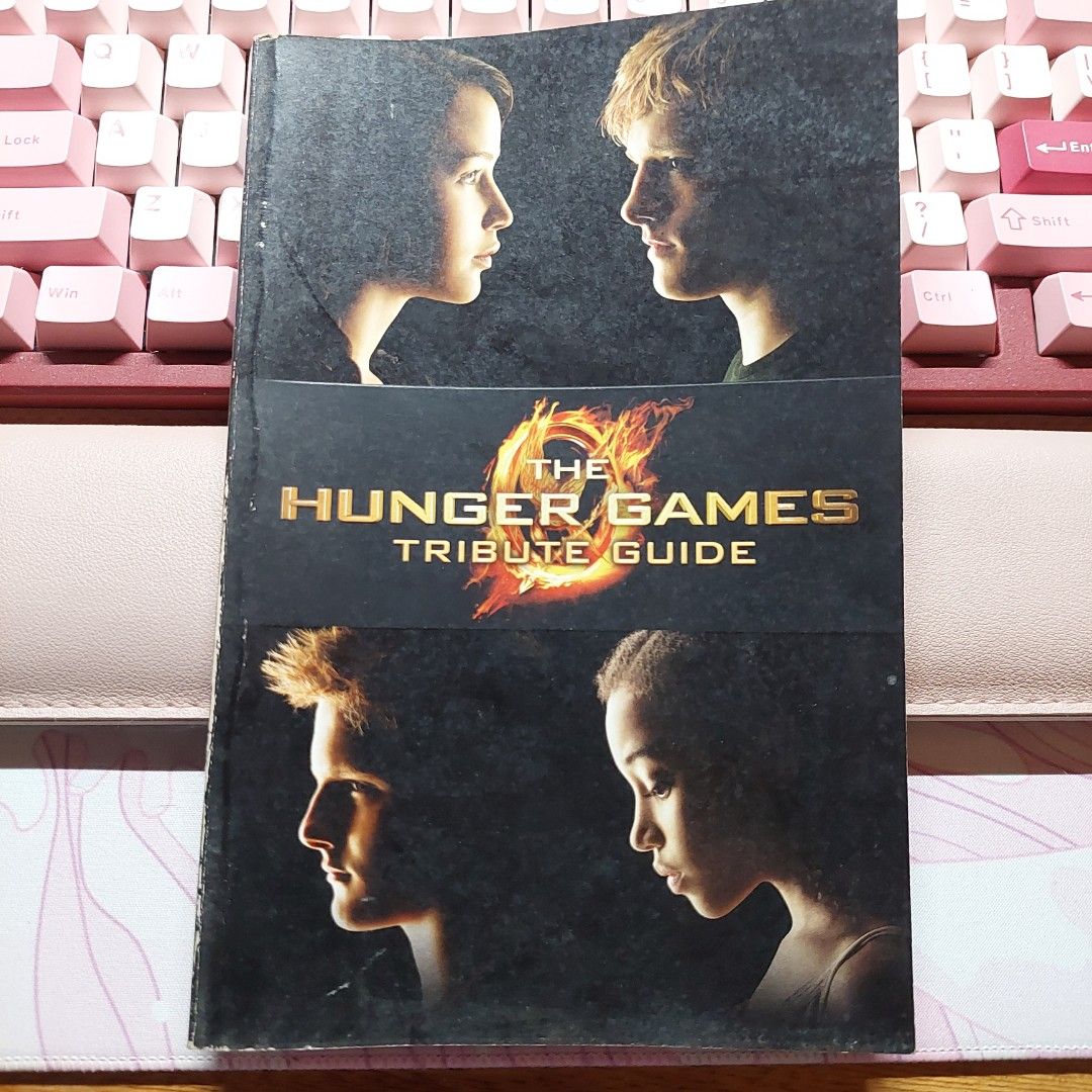 Hunger Games Tribute Guide (Category: Storybooks) located in Bulacan. Submitted by piaattos (Listing ID 1464561242, Image 1). Description: Hunger Games Trubute Guide MOP: GCASH, MAYA, MARIBANK MOD: J&T, GGX.