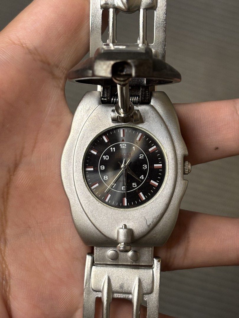 Ice Giga “Steampunk Shield / Mechanical Flip-Cover (Category: Men's Watches) located in Manila. Submitted by soughtafterseconds (Listing ID 1464470000, Image 1). Description: Ice Giga “Steampunk Shield / Mechanical Flip-Cover This Ice Giga “Steampunk Shield / Mechanical Flip-Cover” Quartz Watch is an incredible piece of late-1990s to early-2000s dystopian, cyberpunk-inspired JDM fashion horology. Mounted on a spring-loaded top hinge with a mechan