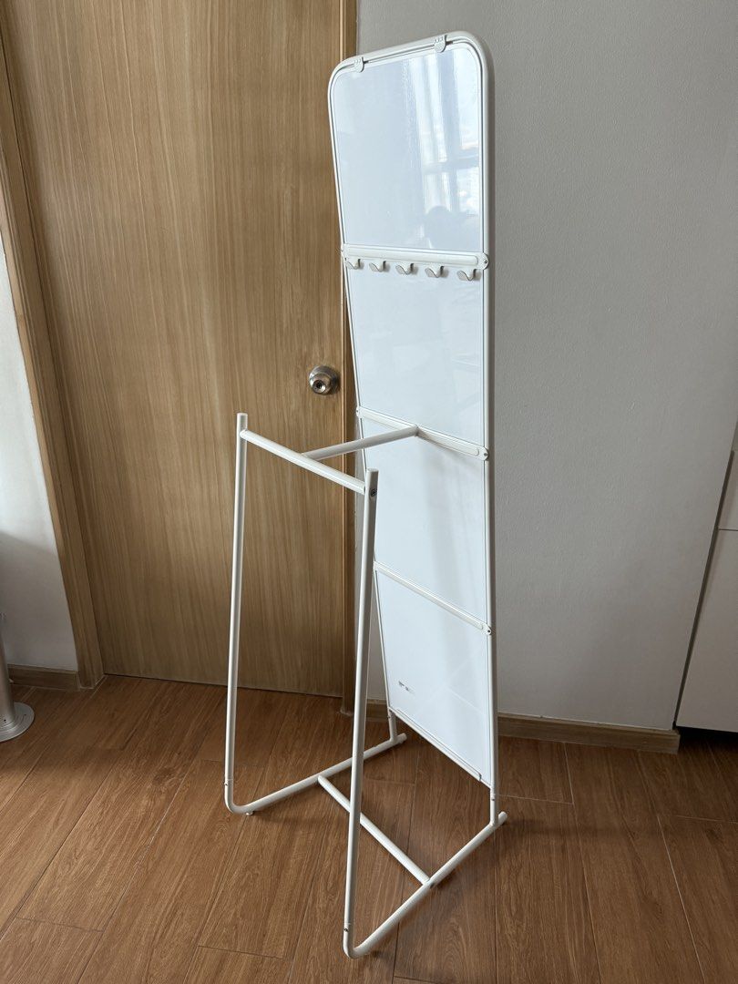 IKEA KNAPPER Full Length Mirror with Hooks and Rack (White) (Category: Mirrors) located in Makati City. Submitted by preheartedgoods (Listing ID 1464390149, Image 2). Description: GOOD AS BRAND NEW!!! No issue, 10/10 Condition No more receipt IKEA KNAPPER full-length mirror in white Convenient hooks at the top for hanging clothes or accessories. Includes a sturdy rack at the bottom, ideal for towels or bags. RFS: Decluttering, need funds No haggl