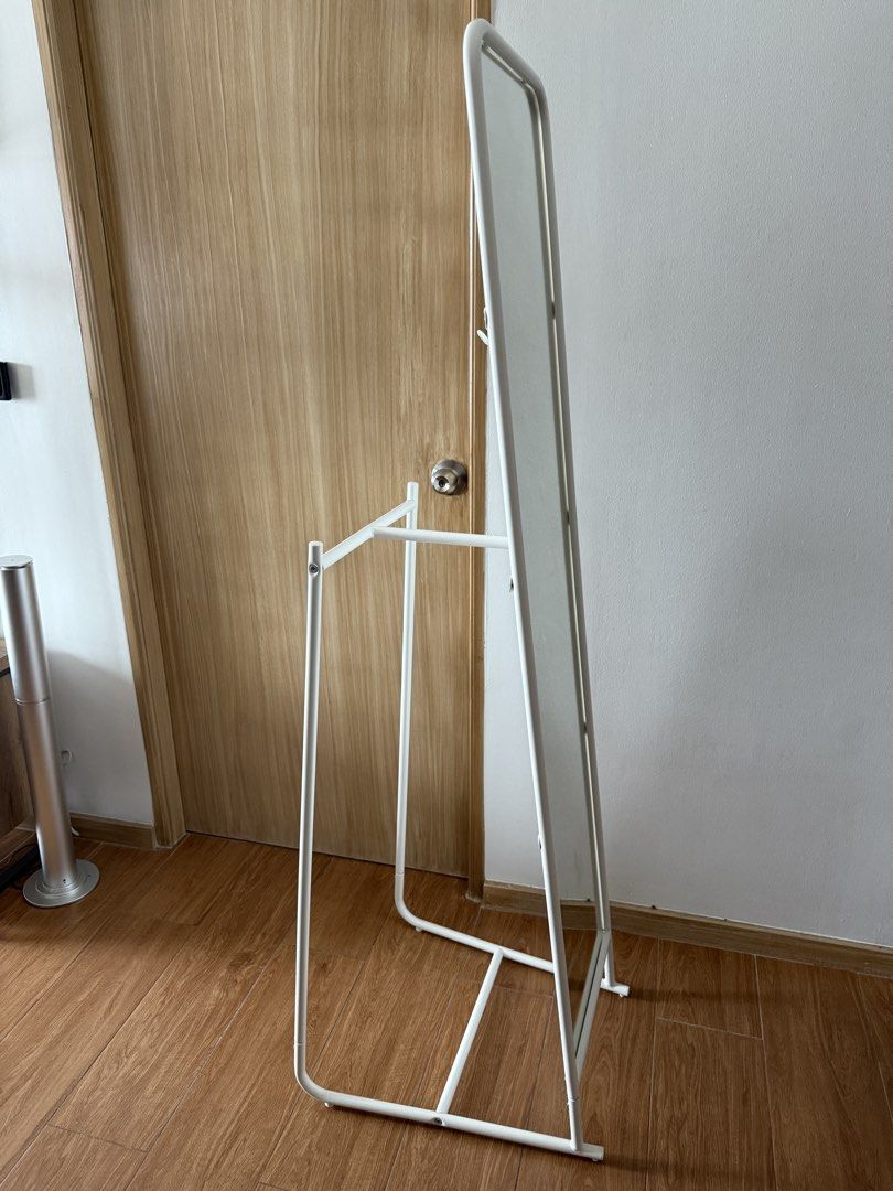 IKEA KNAPPER Full Length Mirror with Hooks and Rack (White) (Category: Mirrors) located in Makati City. Submitted by preheartedgoods (Listing ID 1464390149, Image 3). Description: GOOD AS BRAND NEW!!! No issue, 10/10 Condition No more receipt IKEA KNAPPER full-length mirror in white Convenient hooks at the top for hanging clothes or accessories. Includes a sturdy rack at the bottom, ideal for towels or bags. RFS: Decluttering, need funds No haggl
