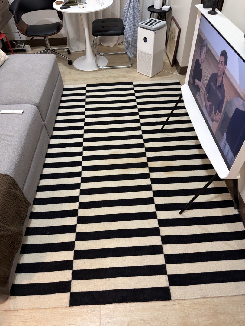 IKEA STOCKHOLM RUG (Category: Carpets, Mats & Flooring) located in Makati City. Submitted by nieller (Listing ID 1464543189, Image 1). Description: - In a presentable condition. - Has a few stain, needs deep cleaning. - 170cm x 240cm.