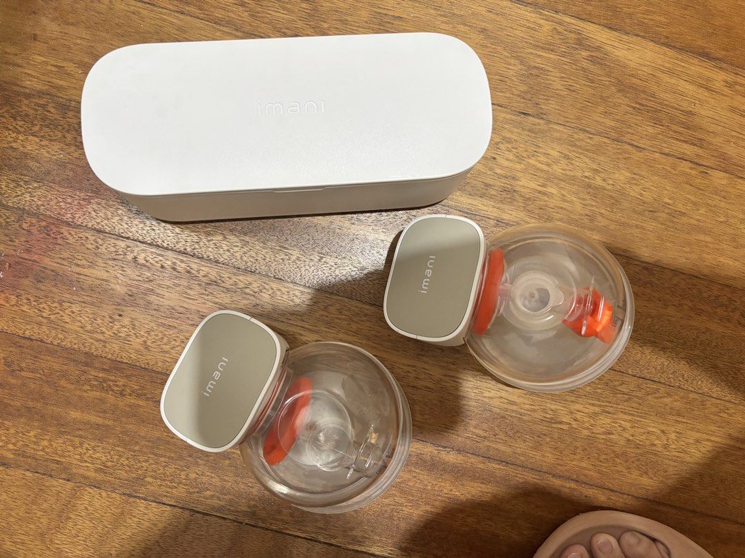 IMANI Breast Pump Q2 Plus / Breast Funnel Set (Category: Breastfeeding & Bottle Feeding) located in Manila. Submitted by decluttering0117 (Listing ID 1464409590, Image 1). Description: Preloved, working condition. Both motors and charging dock tested and working properly. This was given to me by a friend after she finished using it. I personally only tried it a few times because I preferred my Spectra, so it’s just been stored. Includes 2 pump mo