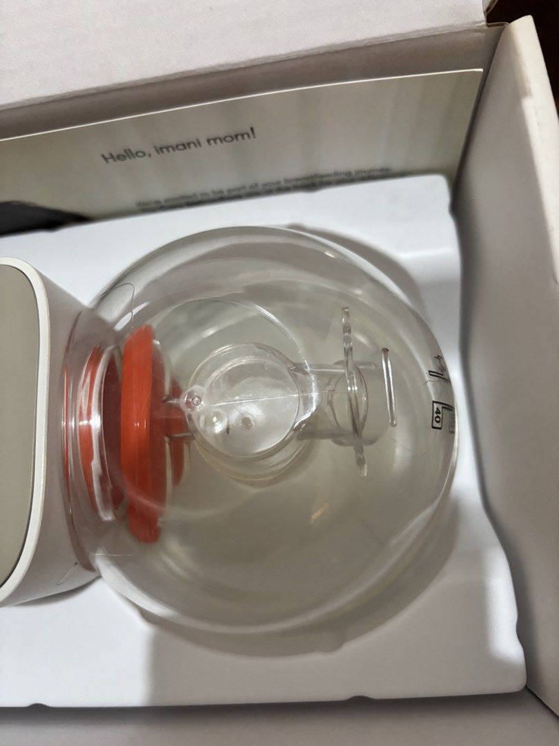 IMANI Breast Pump Q2 Plus / Breast Funnel Set (Category: Breastfeeding & Bottle Feeding) located in Manila. Submitted by decluttering0117 (Listing ID 1464409590, Image 3). Description: Preloved, working condition. Both motors and charging dock tested and working properly. This was given to me by a friend after she finished using it. I personally only tried it a few times because I preferred my Spectra, so it’s just been stored. Includes 2 pump mo